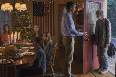 On Thanksgiving The Doorbell Rang, It Was A Man Who Looked Like He Had Nowhere To Go. “Do You Have Any Spare Food?” My Mom Said “Give Him Money And Close The Door.” My Dad Said “Set Another Place. He’s Eating With Us.” I Was Furious. Embarrassed. Then At Dinner He Said Something That Made My Dad Go White. I Had No Idea Who That Man Really Was.